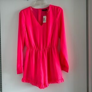 NWT. Size M pink romper